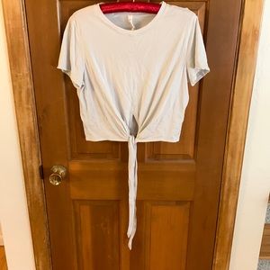 Lululemon size 8, tie front, pale blue shirt